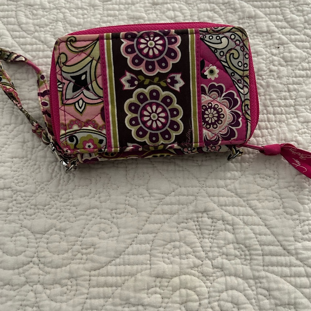 Zippered wallet with card and ID slot.
